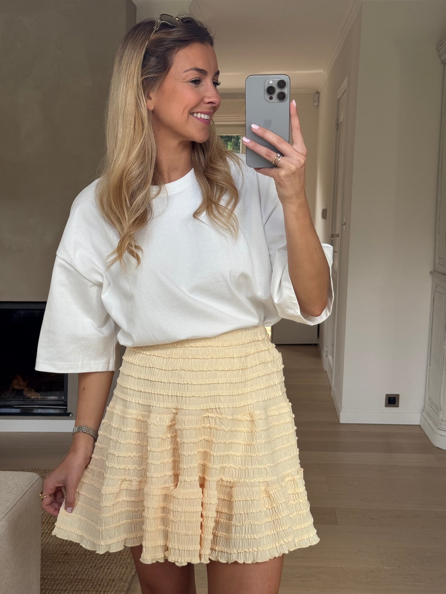 White pleated skirt