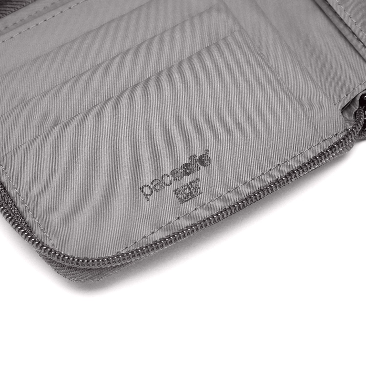 Pacsafe® RFIDsafe™ RFID blocking zip around wallet、mySite、garagedoors4me