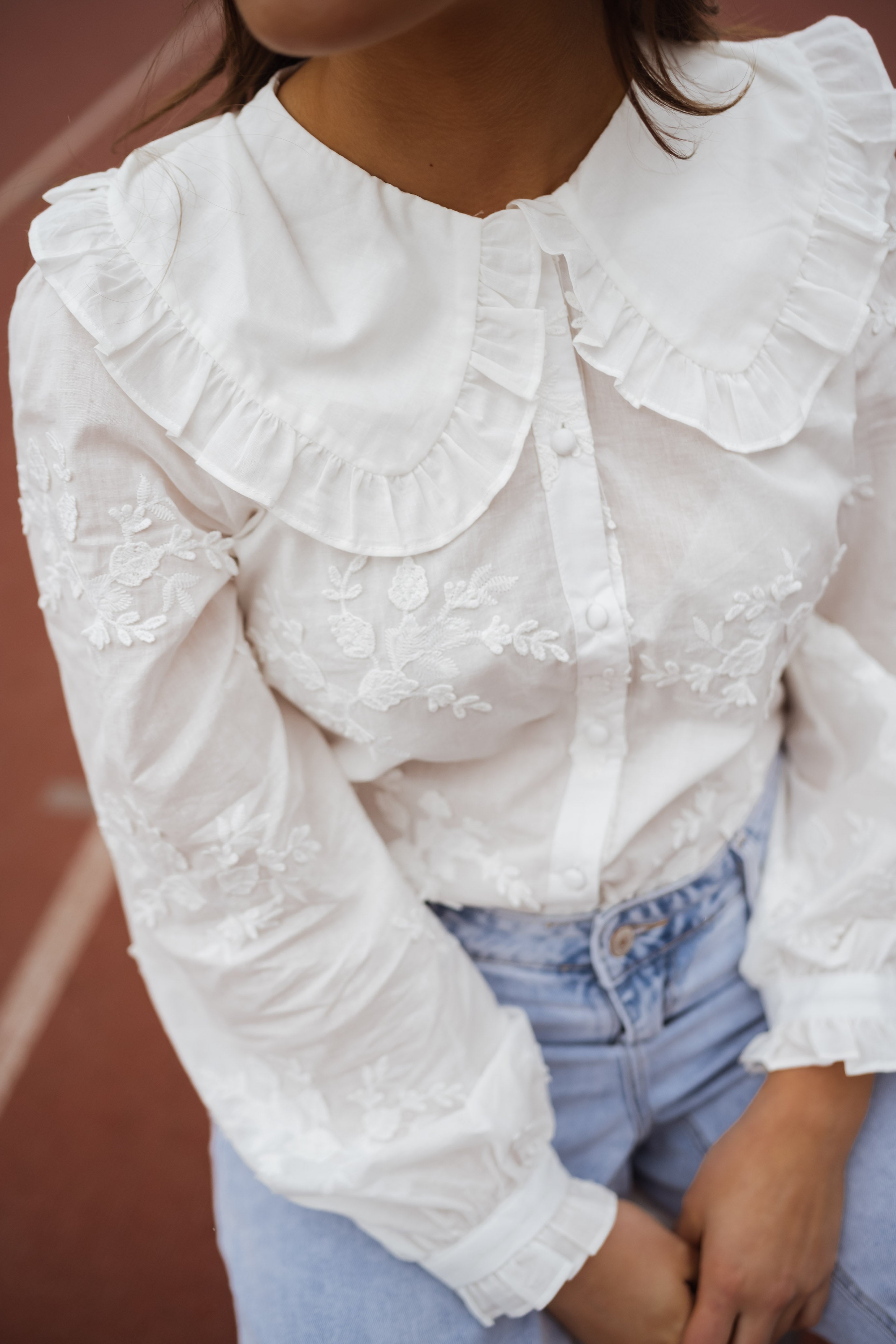 White pleated skirt