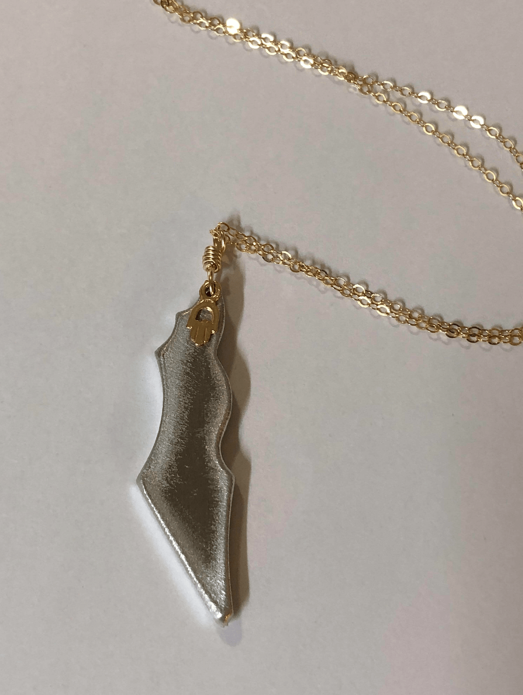 Rocket Hamsa Necklace: Turning Hate into Love、mySite、topwebapps