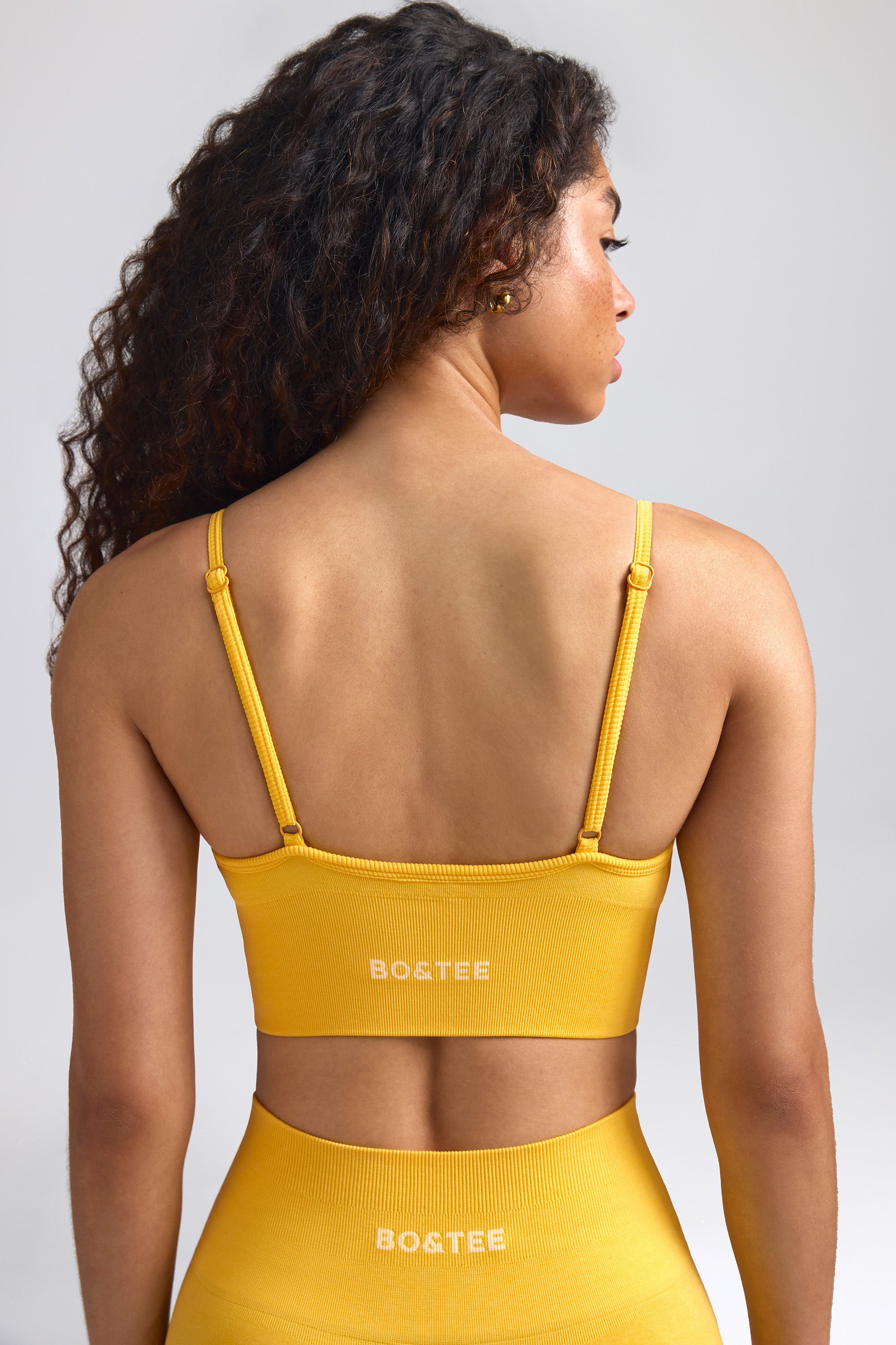 Define Luxe V-Neck Sports Bra in Golden Yellow、mySite、solidvoid