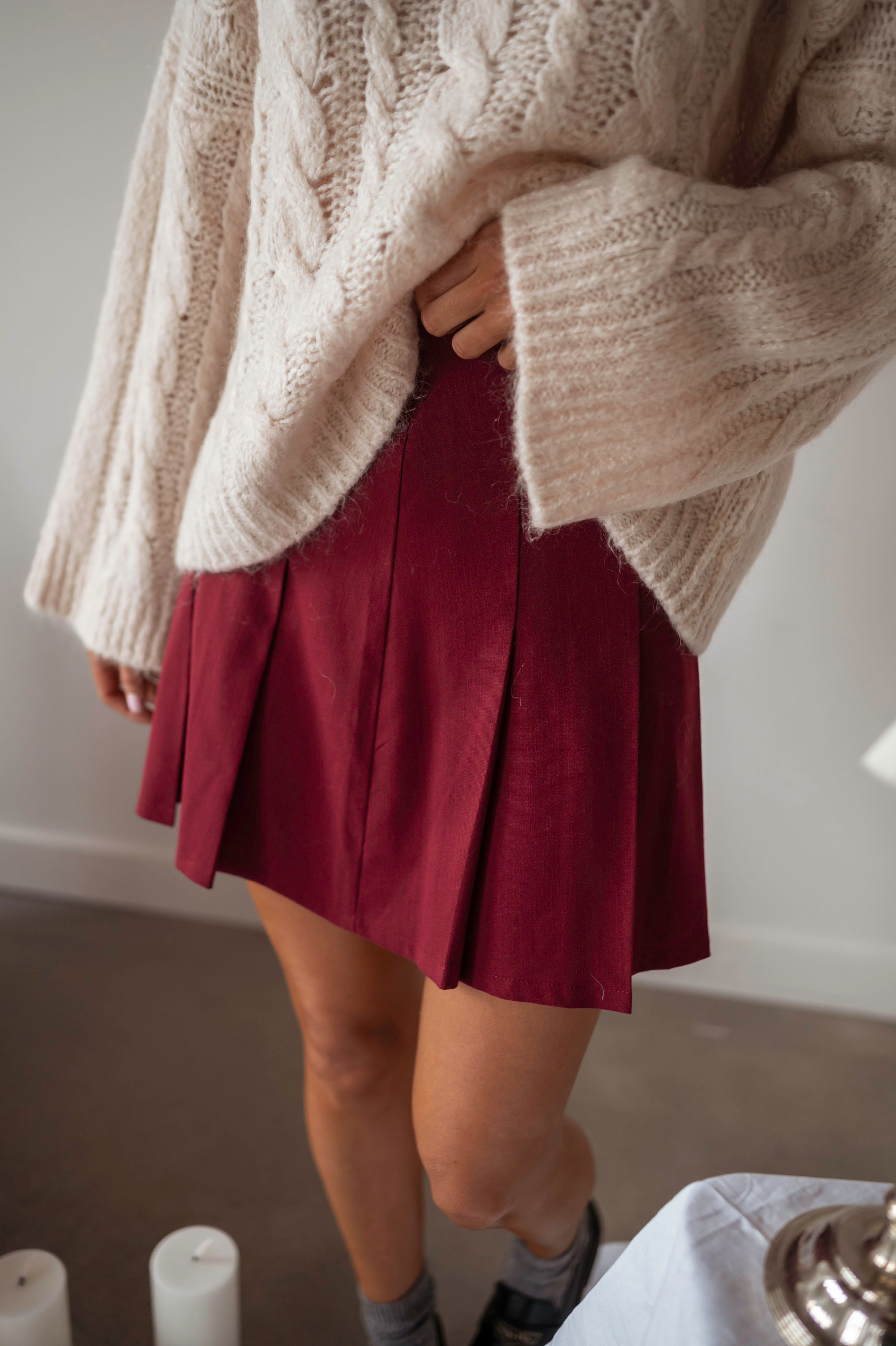 White pleated skirt