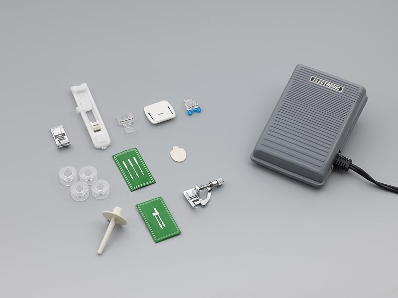 Brother XM3700 included accessories: needles, bobbins, sewing feet, disc screwdriver, darning plate