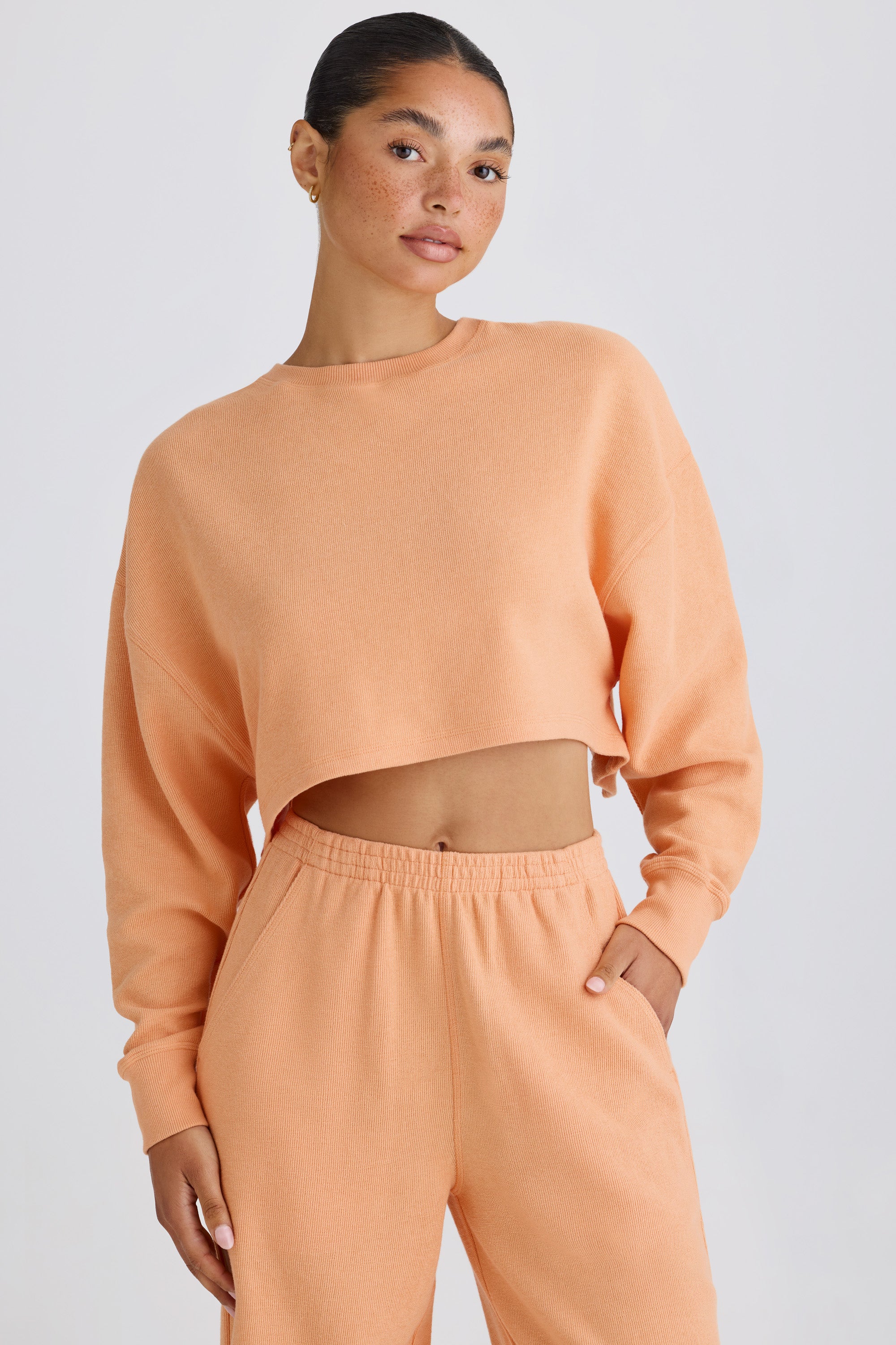 Crew-Neck Open-Back Cropped Sweatshirt in Peach、mySite、solidvoid