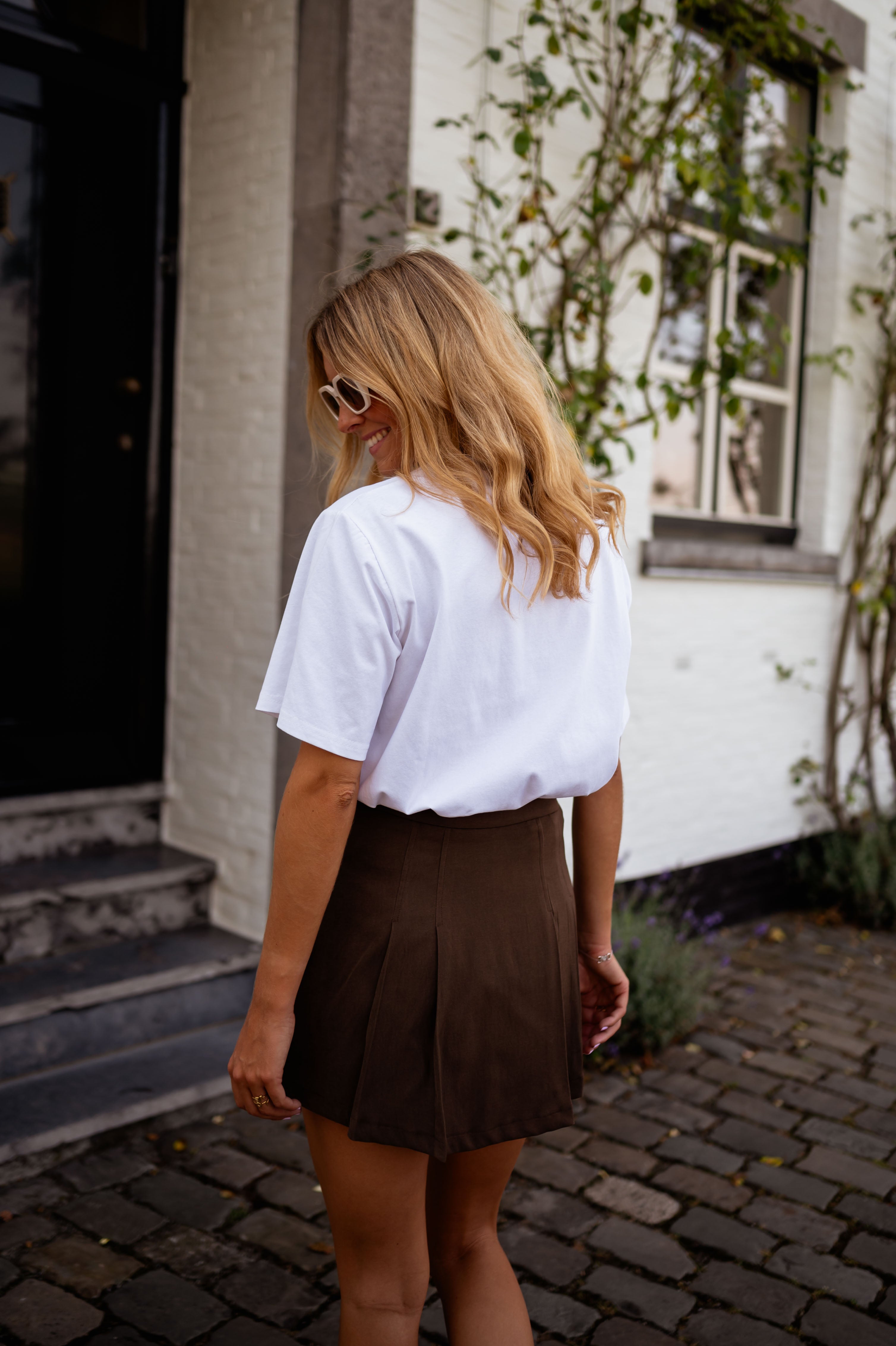White pleated skirt