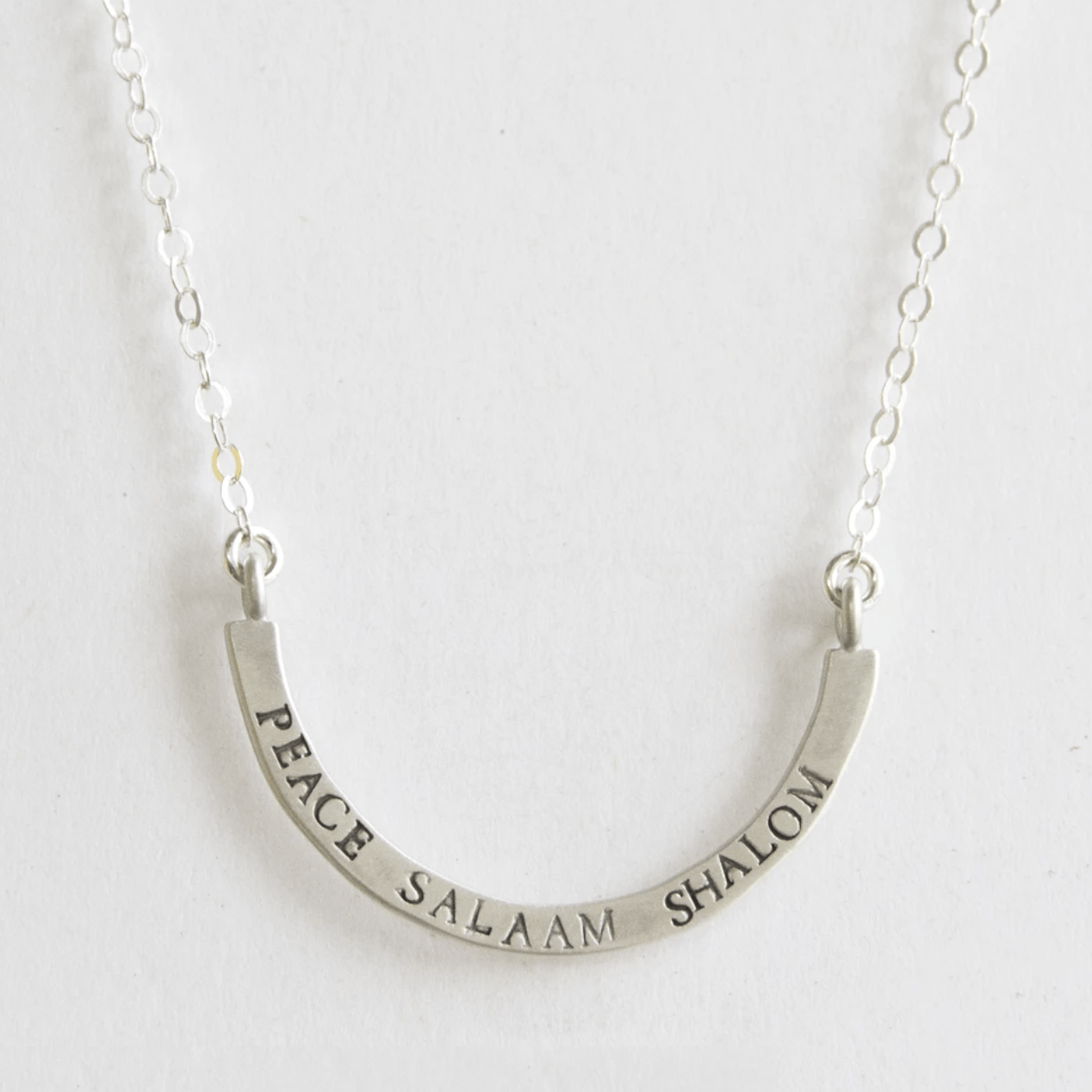 Peace, Salaam, Shalom Cup Half Full Sterling Silver Necklace by Emily Rosenfeld、mySite、topwebapps