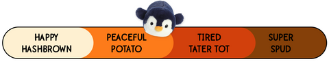 A Spudsters penguin plush by Aurora that is placed at super spud on the spud-o-meter