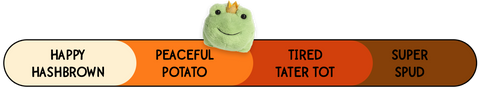 A Spudsters frog prince plush by Aurora that is placed at peaceful potato on the spud-o-meter