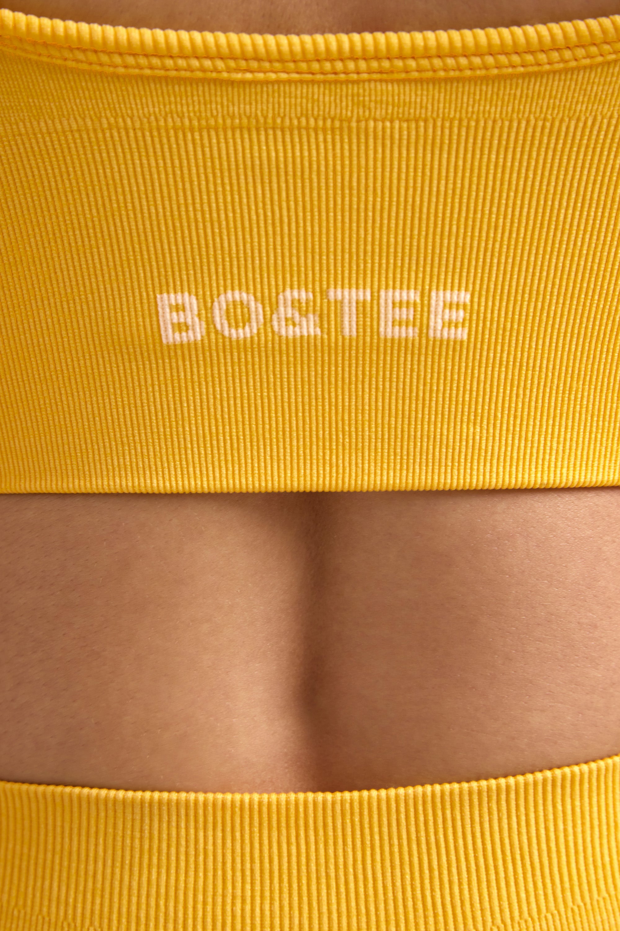 Define Luxe V-Neck Sports Bra in Golden Yellow、mySite、solidvoid