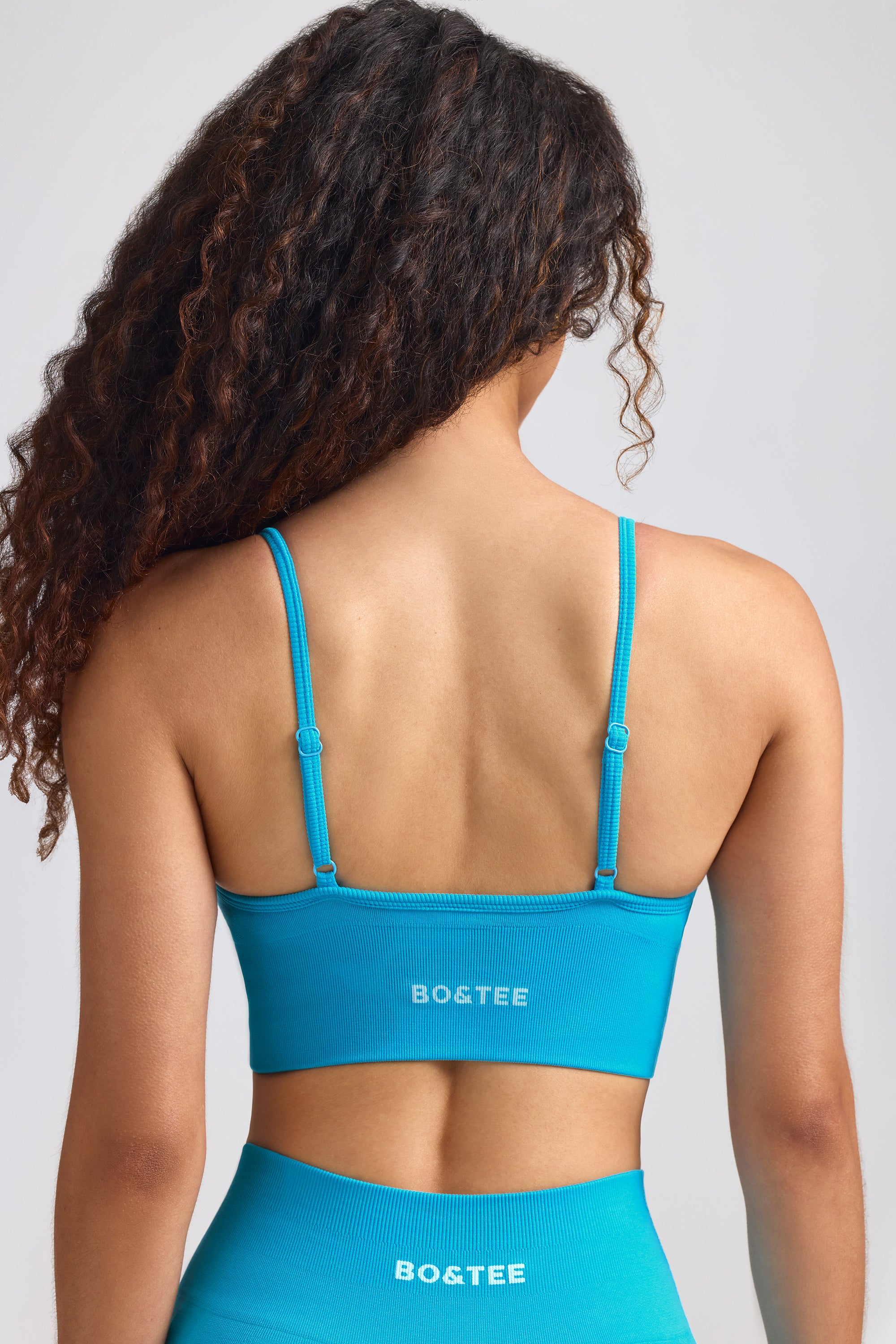 Define Luxe V-Neck Sports Bra in Turquoise Blue、mySite、solidvoid