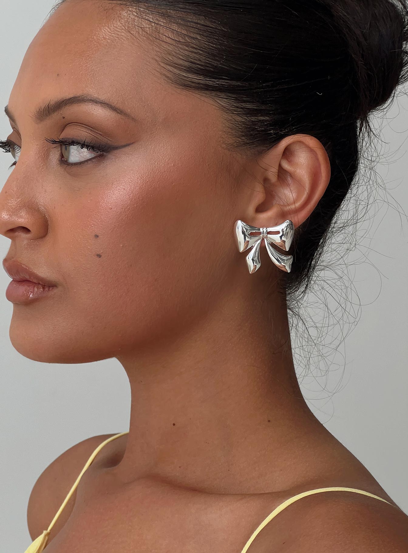 Make Believe Bow Earrings Silver、mySite、solidvoid