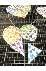 die cut heart shape assembled with multiple orange, green, black, blue, purple, and yellow Hearts Watercolor papers