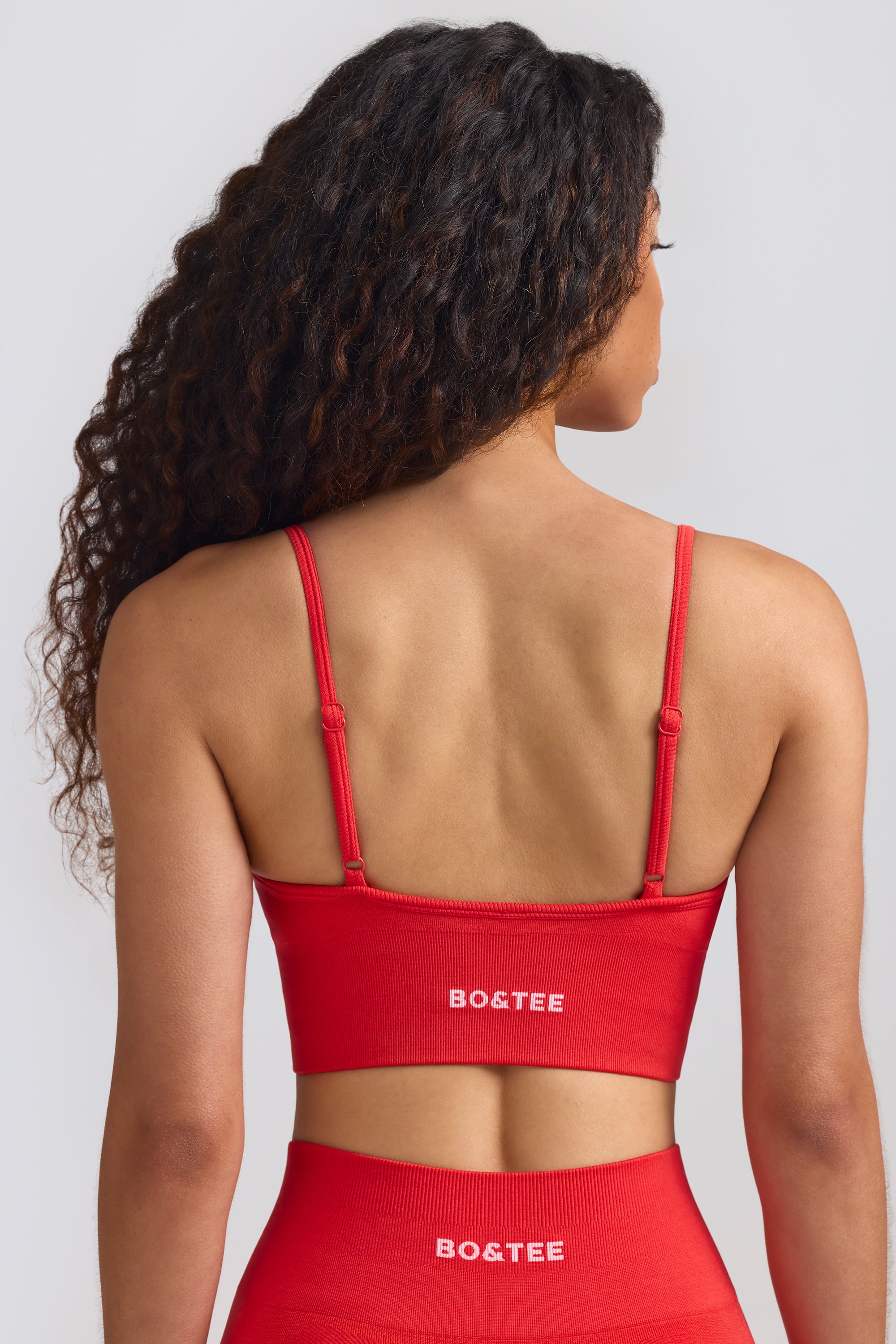 Define Luxe V-Neck Sports Bra in Poppy Red、mySite、solidvoid