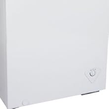 Closeup of manual defrost drain with leakproof plug on the front of the Koolatron chest freezer