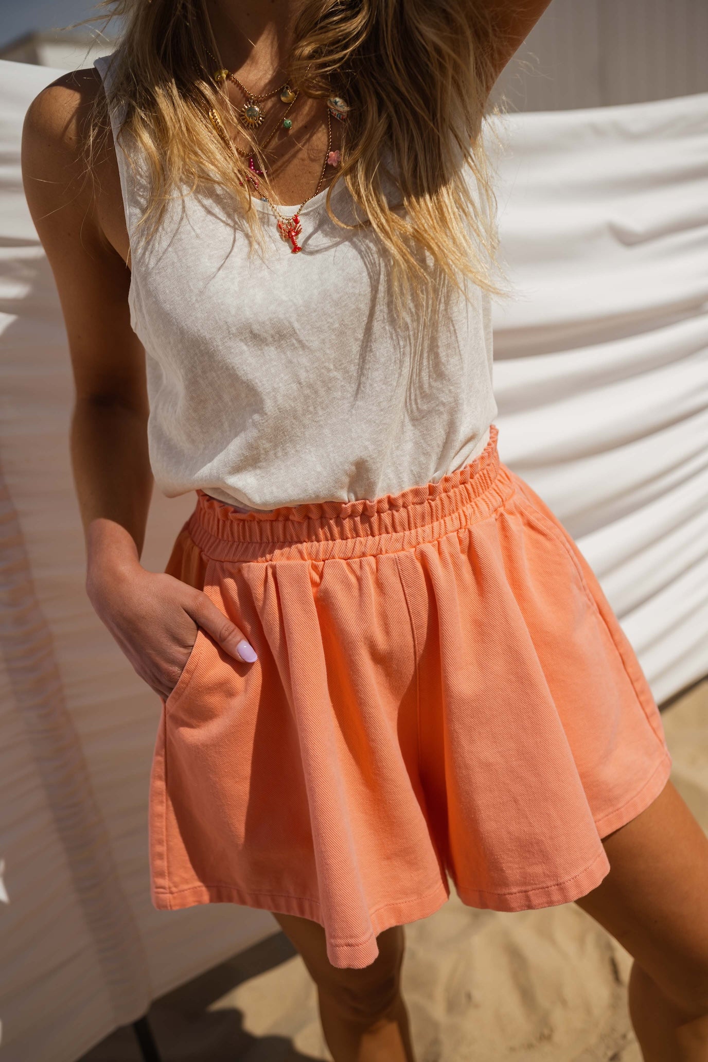 White pleated skirt