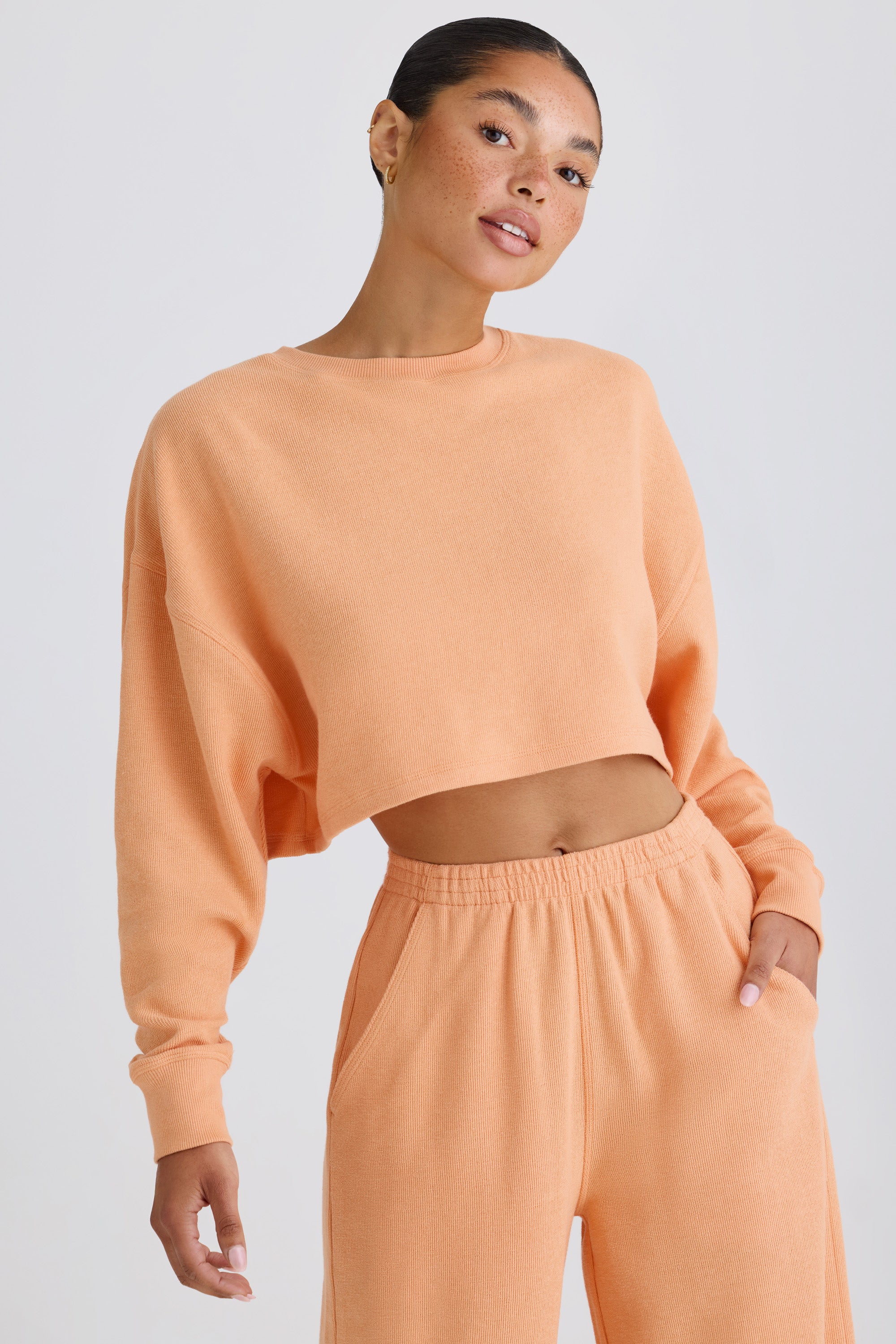 Crew-Neck Open-Back Cropped Sweatshirt in Peach、mySite、solidvoid