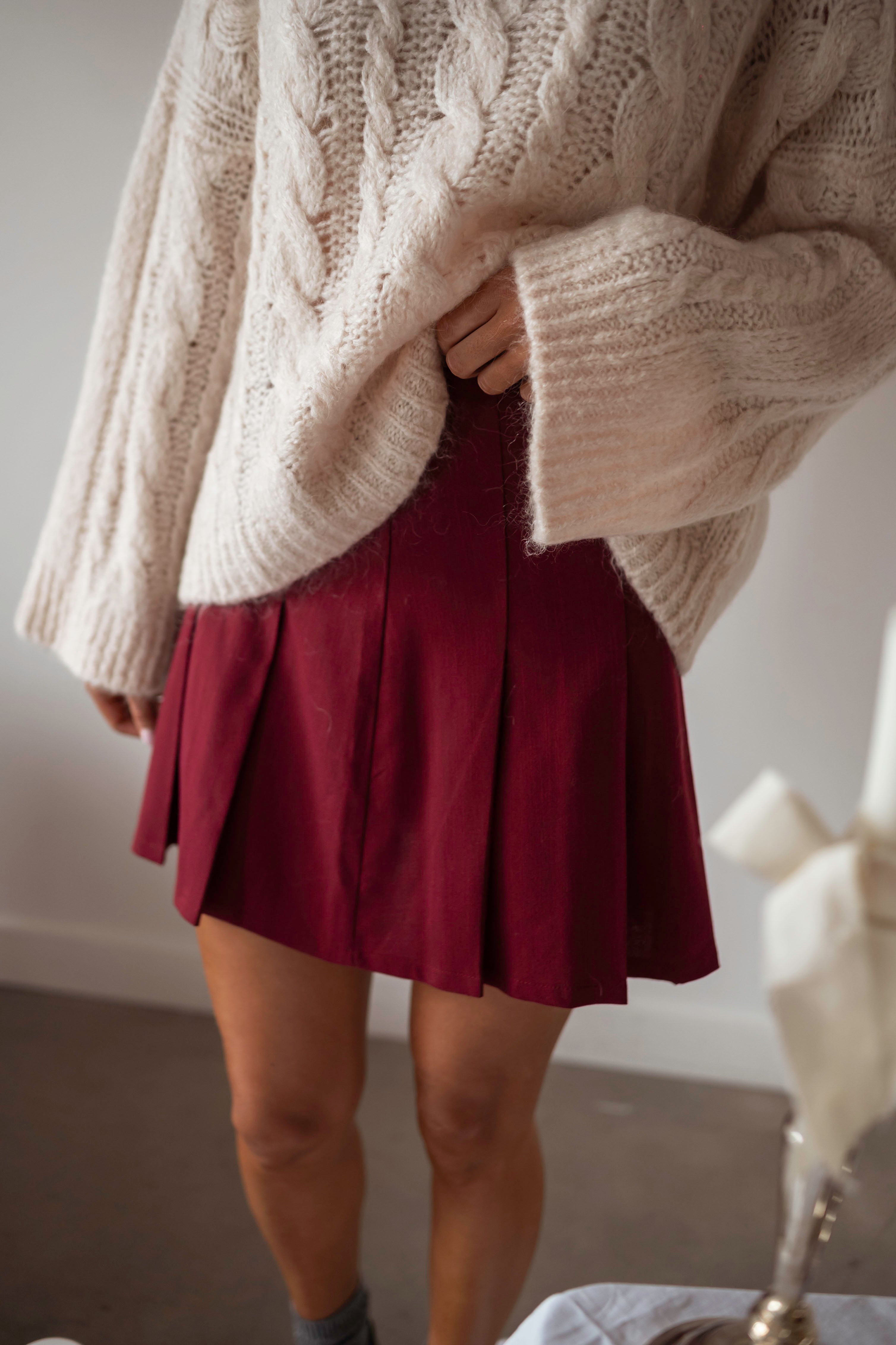 White pleated skirt