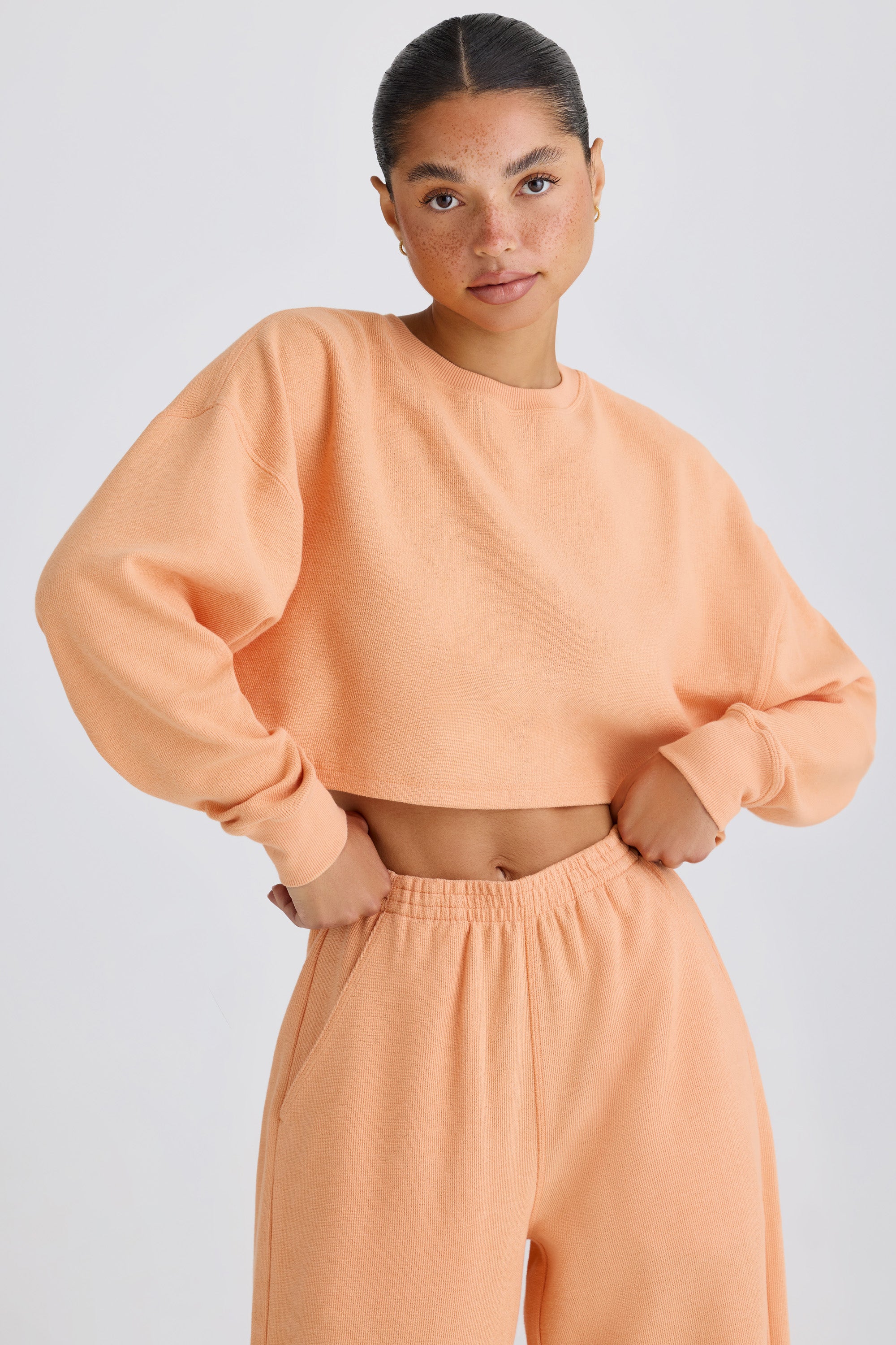 Crew-Neck Open-Back Cropped Sweatshirt in Peach、mySite、solidvoid